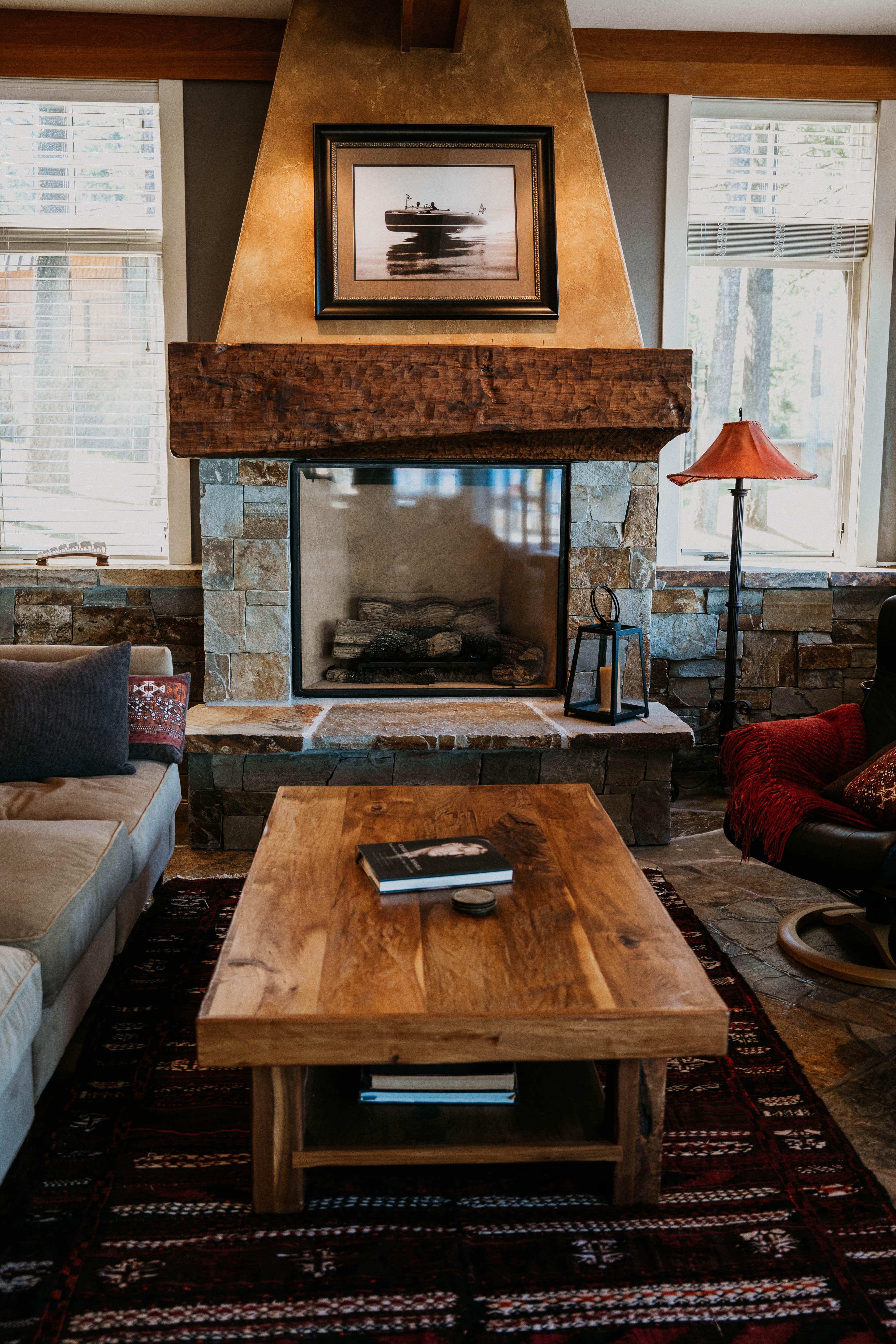 Living room with stone fireplace